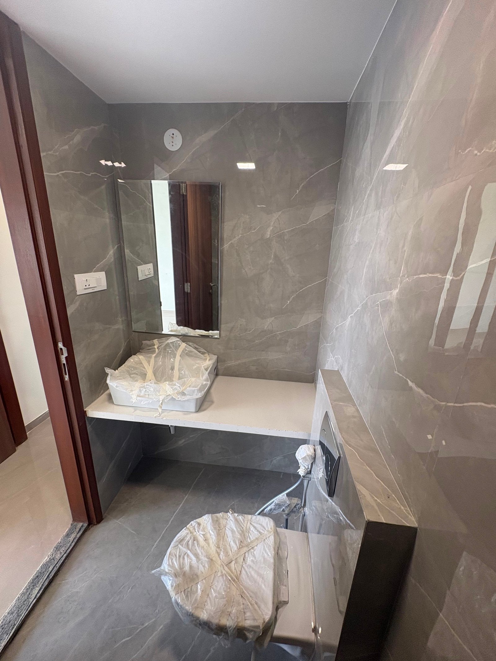 Wall tiling adhesive application